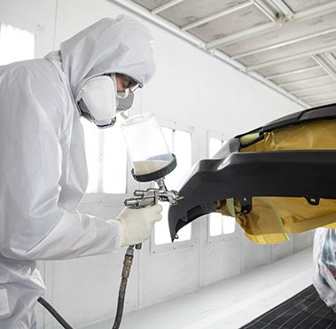 Collision Center Technician Painting a Vehicle | J. Pauley Toyota in Fort Smith AR
